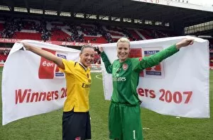 Emma Byrne and Lianne Sanderson (Arsenal) celebrate at the end of the match