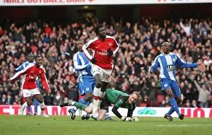 Images Dated 6th December 2008: Emmanual Adebayor shoots past Wigan goalkeeper Chris