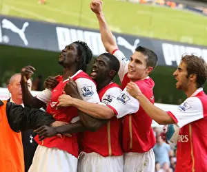 Emmanuel Adebayor (Arsenal) celebrates scoring the 1st Arsenal goal with Kolo Toure