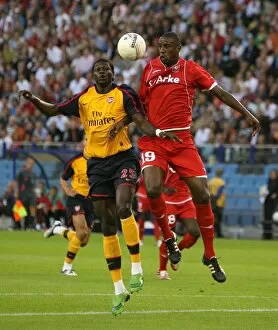 FC Twente v Arsenal Collection: Emmanuel Adebayor (Arsenal) Douglas (FC Twente)