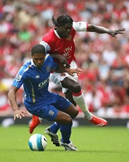 Images Dated 3rd September 2007: Emmanuel Adebayor (Arsenal) Glen Johnson (Portsmouth)