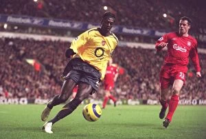Images Dated 28th February 2006: Emmanuel Adebayor (Arsenal) Jamie Carragher (Liverpool). Liverpool 1: 0 Arsenal