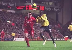 Liverpool v Arsenal 2005-6 Collection: Emmanuel Adebayor (Arsenal) Jamie Carragher (Liverpool). Liverpool 1: 0 Arsenal