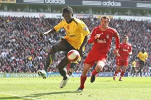 Liverpool v Arsenal 2006-7 Collection: Emmanuel Adebayor (Arsenal) Jamie Carragher (Liverpool)