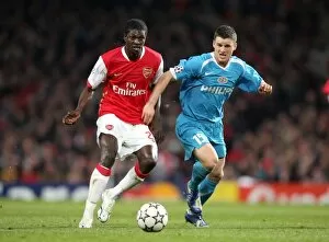 Images Dated 7th March 2007: Emmanuel Adebayor (Arsenal) Jason Culina (PSV)