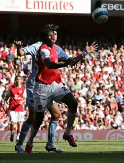 Images Dated 25th August 2007: Emmanuel Adebayor (Arsenal) Javier Garrido (Man City)