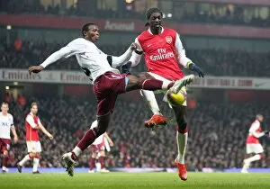 Images Dated 1st January 2008: Emmanuel Adebayor (Arsenal) John Pantsil (West Ham)