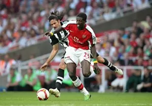 Images Dated 30th August 2008: Emmanuel Adebayor (Arsenal) Jonas Gutierrez (Newcastle)