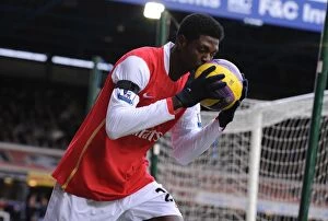 Images Dated 24th February 2008: Emmanuel Adebayor (Arsenal) kisses the matchball