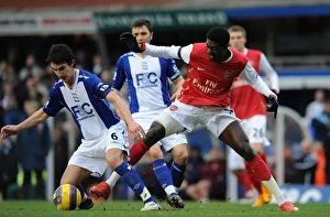 Images Dated 24th February 2008: Emmanuel Adebayor (Arsenal) Liam Ridgewell (Birmingham City)