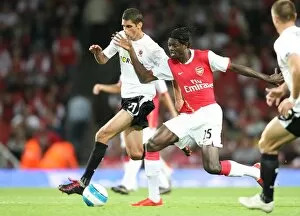 Emmanuel Adebayor (Arsenal) Lubos Husek (Sparta Prague)