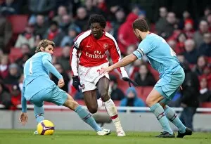 Arsenal v West Ham United 2008-9 Collection: Emmanuel Adebayor (Arsenal) Lucas Neill and Valon Behrami (West Ham)