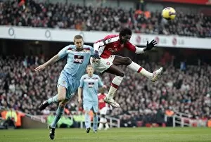 Arsenal v West Ham United 2008-9 Collection: Emmanuel Adebayor (Arsenal) Matthew Upson (West Ham)