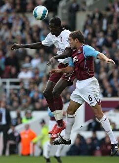 Images Dated 1st October 2007: Emmanuel Adebayor (Arsenal) Matthew Upson (West Ham)