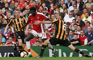 Arsenal v Hull City 2008-9 Collection: Emmanuel Adebayor (Arsenal) Michael Turner (Hull)