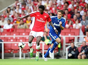 Emmanuel Adebayor (Arsenal) Miguel Torres (Real)