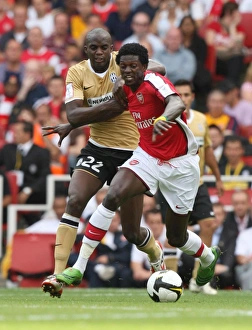 Emmanuel Adebayor (Arsenal) Mohamed Sissoko (Juve) Emmanuel Adebayor (Arsenal) Mohamed Sissoko (Juve)