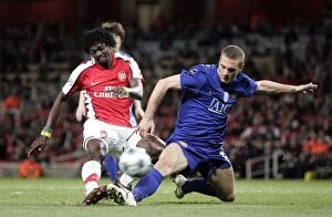 Arsenal v Manchester United - Champions League 2008-09 Collection: Emmanuel Adebayor (Arsenal) Nemanja Vidic (Man Utd)