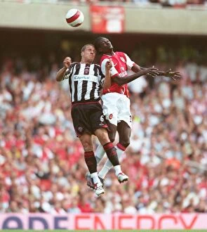 Images Dated 23rd September 2006: Emmanuel Adebayor (Arsenal) Phil Jagielka (Sheff Utd)