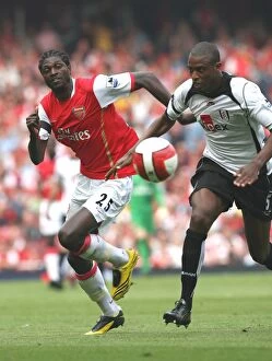 Arsenal v Fulham 2006-07 Collection: Emmanuel Adebayor (Arsenal) Philippe Christanval (Fulham)