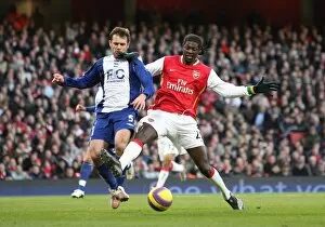 Images Dated 12th January 2008: Emmanuel Adebayor (Arsenal) Rafeal Schmitz (Birmingham)