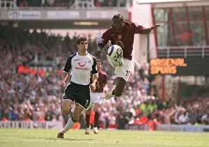 Images Dated 22nd April 2006: Emmanuel Adebayor (Arsenal) Satleri (Tottenham). Arsenal 1: 1 Tottenham Hotspur