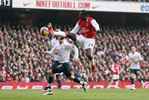 Arsenal v Tottenham 2007-8 Collection: Emmanuel Adebayor (Arsenal) Teemu Tainio (Spurs)