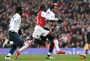 Arsenal v Tottenham 2007-8 Collection: Emmanuel Adebayor (Arsenal) Younes Kaboul and Pascal Chimbonda (Tottenham)