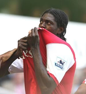 Emmanuel Adebayor celebrates scoring the 2nd Arsenal goal