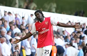 Emmanuel Adebayor celebrates scoring the 3rd Arsenal goal