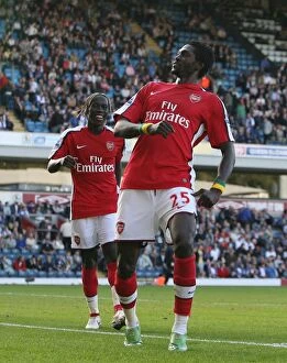 Emmanuel Adebayor celebrates scoring the 4th Arsenal