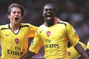 Emmanuel Adebayor celebrates scoring the Arsenal goal with Tomas Rosicky