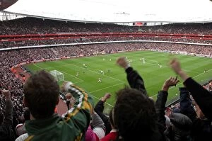 Fans Collection: Emmanuel Adebayor celebrates scoring Arsenals 1st goal