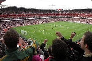 Fans Collection: Emmanuel Adebayor celebrates scoring Arsenals 1st goal