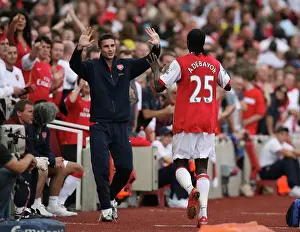 Emmanuel Adebayor celebrates scoring Arsenals 2nd goal his 1st with substitute Robin van Persie. Arsenal 5: 0 Derby County. Barclays Premier League. Emirates Stadium, 22 / 9 / 07. Credit: Arsenal Football Club /