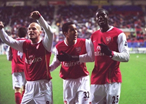 Wigan Athletic v Arsenal 2006-07 Gallery: Emmanuel Adebayor celebrates scoring Arsenals goal with Theo Walcott