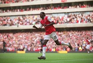 Images Dated 14th October 2006: Emmanuel Adebayor celebrates scoring Arsenals 3rd goal