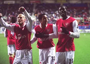 Wigan Athletic V Arsenal 2006-07 Prints: Emmanuel Adebayor celebrates scoring Arsenals goal with Theo Walcott