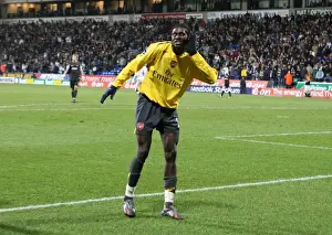 Emmanuel Adebayor celebrates scoring hte 3rd Arsenal goal