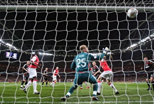 Emmanuel Adebayor heads past Liverpool Pepe Reina to scote the Arsenal goal Emmanuel Adebayor heads past Liverpool Pepe Reina to scote the Arsenal goal