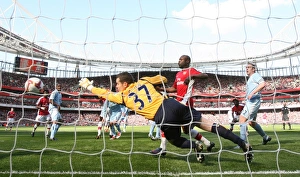 Emmanuel Adebayor heads past Shay Given to score the 1st Arsenal goal Emmanuel Adebayor heads past Shay Given to score the 1st Arsenal goal