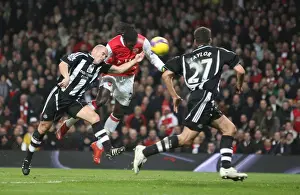 Emmanuel Adebayor heads past Stephen Carr to score the 1st Arsenal goal