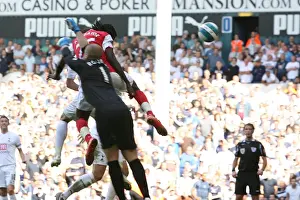 Emmanuel Adebayor heads past Tottenham goalkeeper Paul Robinson to score the 1st Arsenal goal