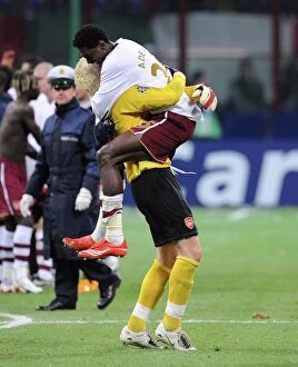 Images Dated 5th March 2008: Emmanuel Adebayor and Manuel Almunia celebrate Arsenals victory