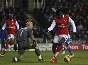 Emmanuel Adebayor rounds Reading goalkeeper Marcus Hahnemann to score but his goal is disalowed for off side Reading 1