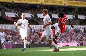 Images Dated 17th September 2007: Emmanuel Adebayor scores Arsenals 3rd goal under pressure from Michael Dawson