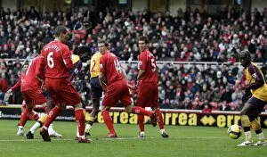 Images Dated 13th December 2008: Emmanuel Adebayor scores Arsenals goal beating Robert