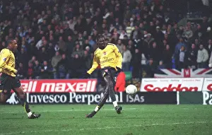 Emmanuel Adebayor shoots into an empty net to score the 3rd Arsenal goal