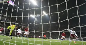 Emmanuel Adebayor shoots past AC Milan goalkeeper Zelijo Kalac to score the 2nd Arsenal goal