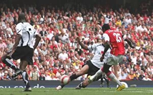 Arsenal v Fulham 2006-07 Collection: Emmanuel Adebayor shoots past Fulham goalkeeper Antti Niemi to score the 2nd Arsenal goal